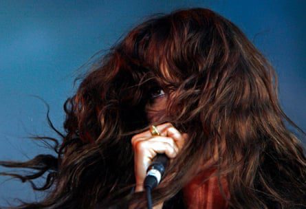 Playing in Budapest, 2008. Her face is covered with her haid