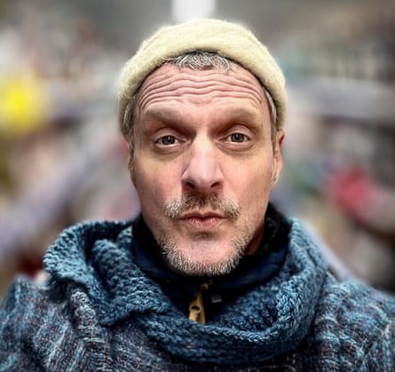 DJ Koze in a cream beanie.